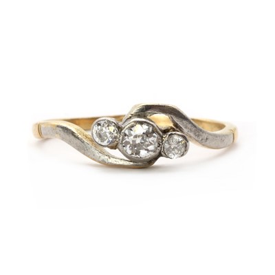 Lot 67 - A gold three stone diamond ring