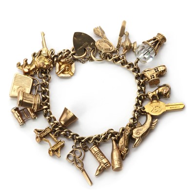 Lot 271 - A gold charm bracelet