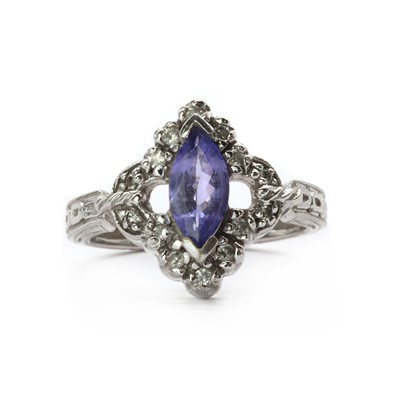 Lot 166 - A 14ct white gold tanzanite and diamond cluster ring