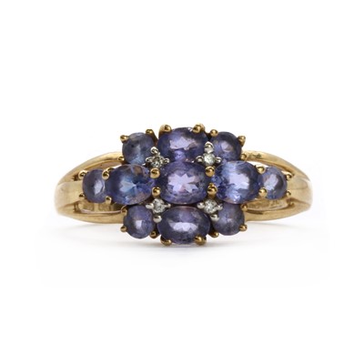 Lot 169 - A 9ct gold tanzanite and diamond cluster ring