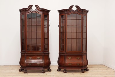 Lot 245 - A pair of Dutch-style walnut vitrines by Gillows of Lancaster