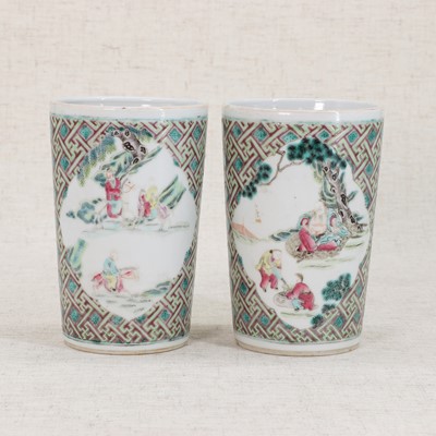 Lot 65 - A pair of Chinese famille rose brush pots