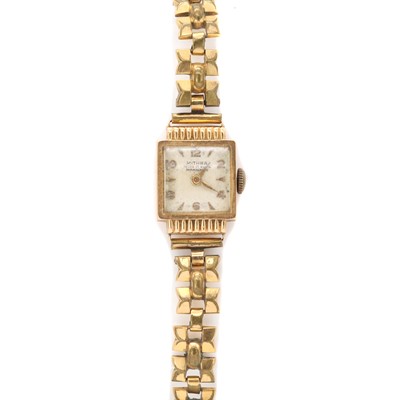 Lot 395 - A ladies' gold Mithra mechanical bracelet watch