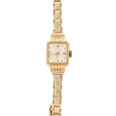 Lot 396 - A ladies' gold Mithra mechanical bracelet watch