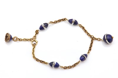 Lot 80 - A lapis lazuli, rock crystal and seed pearl bracelet