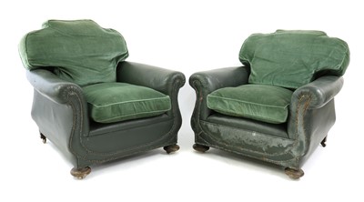 Lot 377 - A pair of green leather club armchairs