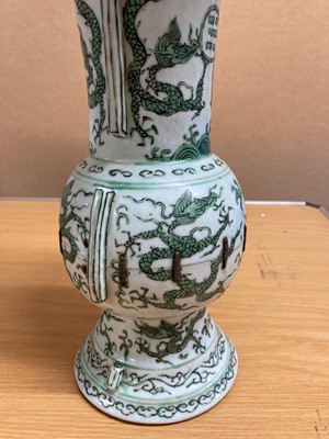 Lot 152 - A Chinese green enamelled gu vase