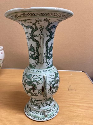 Lot 152 - A Chinese green enamelled gu vase