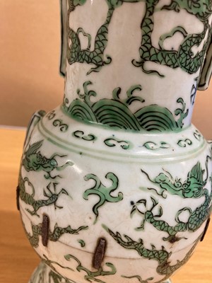 Lot 152 - A Chinese green enamelled gu vase