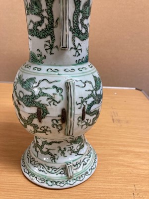 Lot 152 - A Chinese green enamelled gu vase