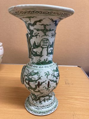 Lot 152 - A Chinese green enamelled gu vase