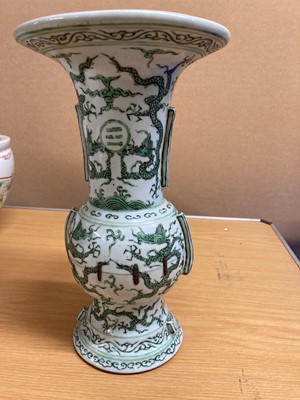 Lot 152 - A Chinese green enamelled gu vase