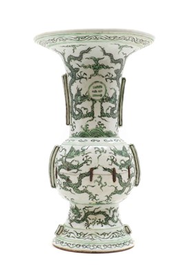 Lot 152 - A Chinese green enamelled gu vase