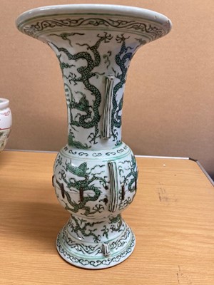 Lot 152 - A Chinese green enamelled gu vase