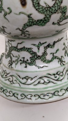 Lot 152 - A Chinese green enamelled gu vase