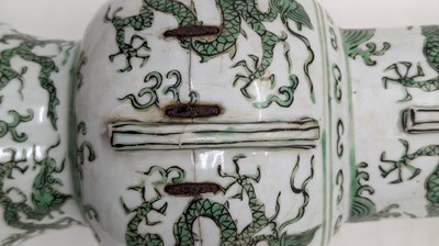 Lot 152 - A Chinese green enamelled gu vase