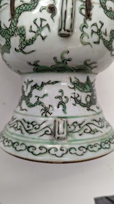 Lot 152 - A Chinese green enamelled gu vase