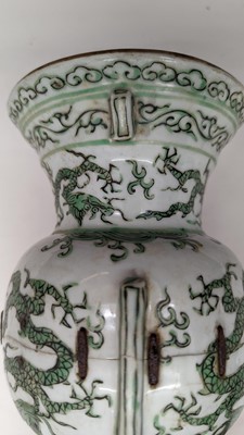 Lot 152 - A Chinese green enamelled gu vase