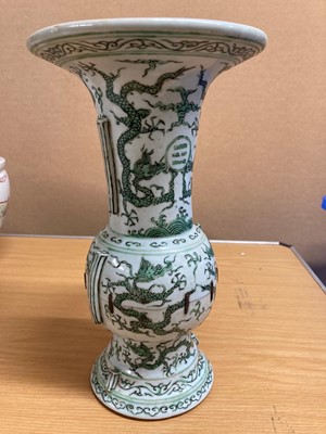 Lot 152 - A Chinese green enamelled gu vase
