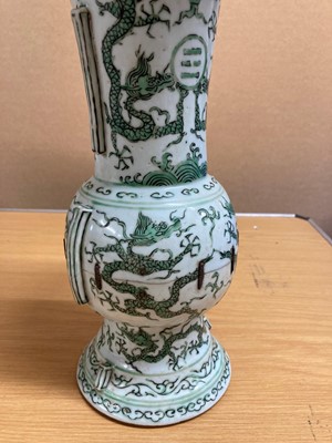 Lot 152 - A Chinese green enamelled gu vase