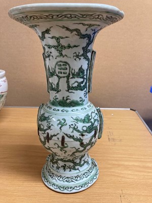 Lot 152 - A Chinese green enamelled gu vase