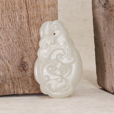 Lot 107 - A Chinese jade pendant