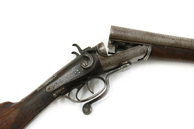 Lot 106 - A breech loading percussion action shotgun