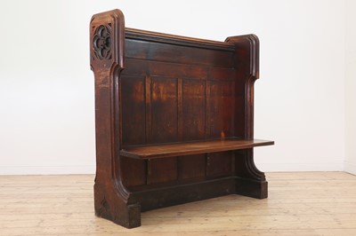 Lot 611 - A Victorian Gothic Revival oak pew