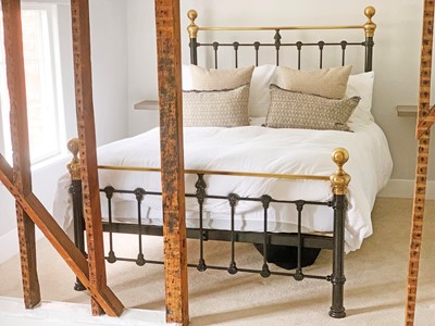 Lot 578 - A modern iron framed bedstead by the Original Bed Company