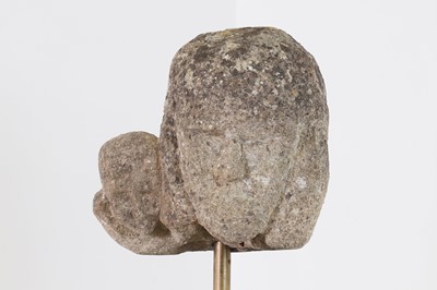 Lot 33 - A weathered sandstone head