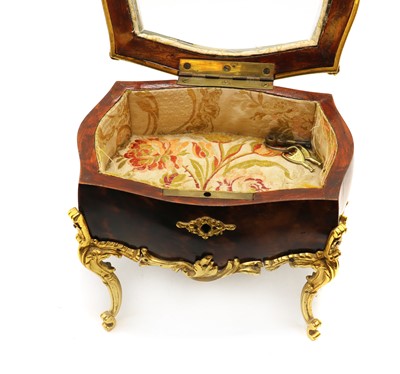Lot 347 - A brass mounted tortoiseshell jewellery box
