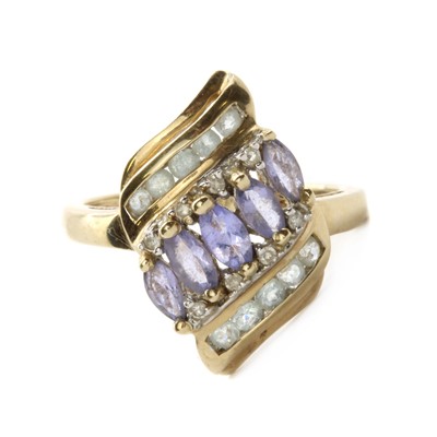 Lot 170 - A 9ct gold tanzanite and diamond cluster ring