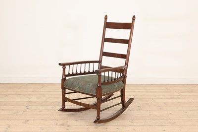 Lot 607 - An Arts and Crafts rocking chair