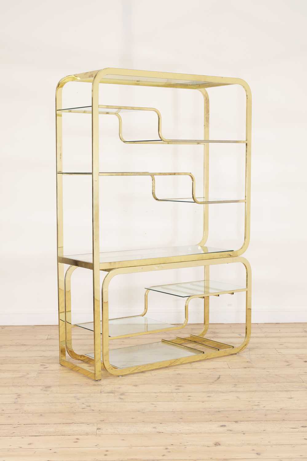 Lot 336 - A brass two-part freestanding wall shelf,