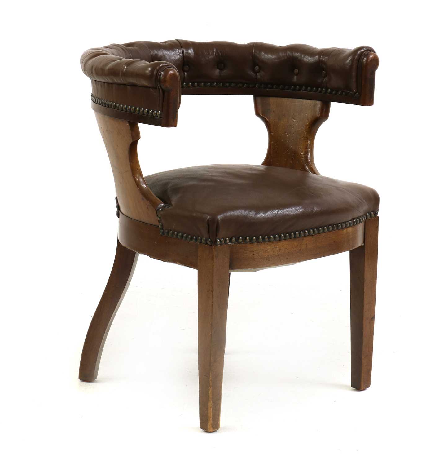 Lot 507 - A walnut and buttoned leather armchair