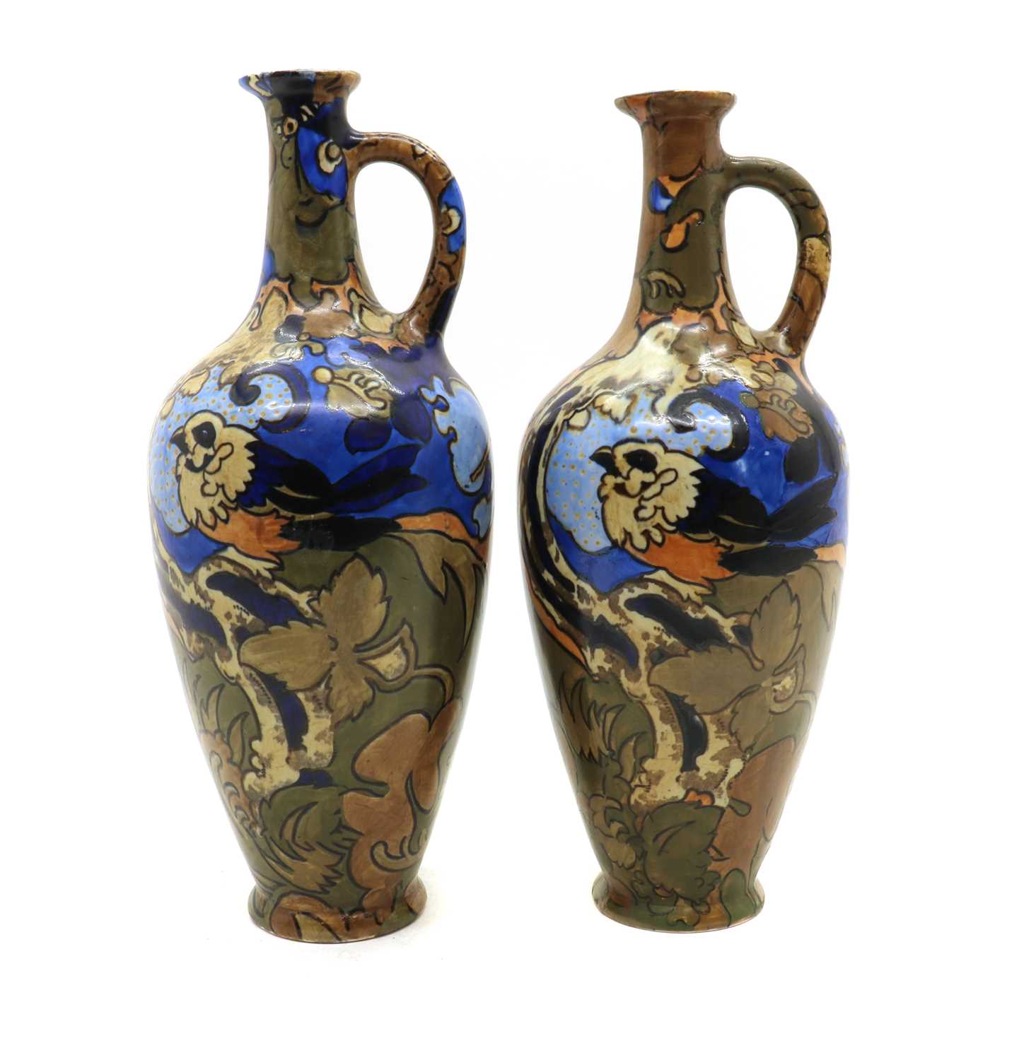 Lot 216 - A near pair of Frederick Rhead Amstel pottery ewers