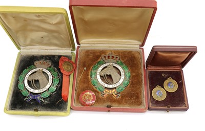 Lot 46 - A cased pair of enamelled Club de Campo medals