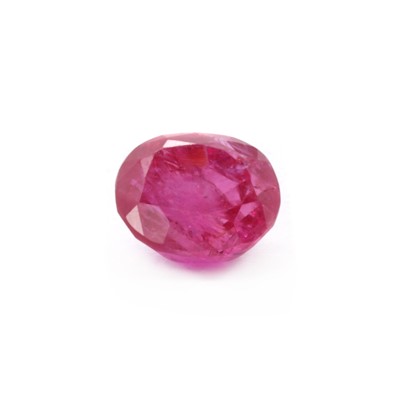 Lot 239 - An unmounted oval mixed cut ruby