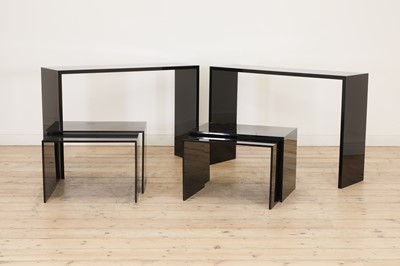 Lot 406 - A pair of contemporary black Lucite console tables