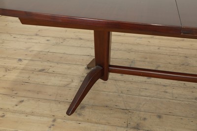 Lot 633 - A Gordon Russell mahogany and Bombay rosewood 'Burford' dining table