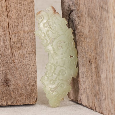 Lot 228 - A Chinese jade pendant