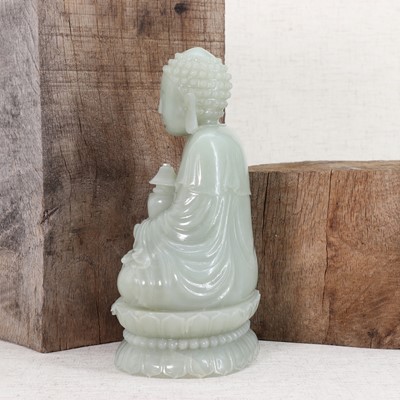 Lot 111 - A Chinese jade Buddha