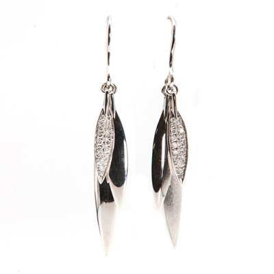 Lot 93 - A pair of 18ct white gold diamond set graduated feather earrings