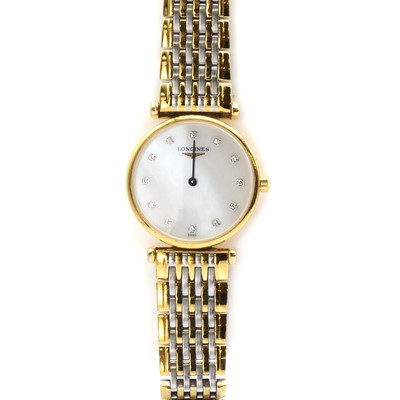 Lot 1423 - A bi-colour Longines La Grande Classique quartz bracelet watch