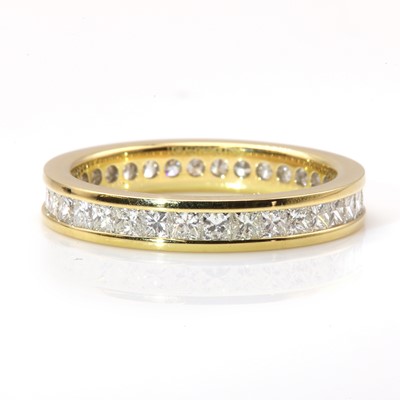 Lot 253 - An 18ct gold diamond set full eternity ring