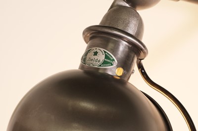 Lot 396 - A Jieldé polished steel articulated lamp