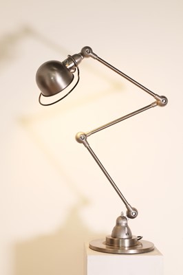 Lot 396 - A Jieldé polished steel articulated lamp