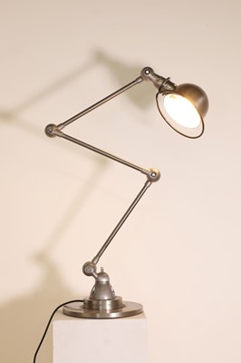 Lot 396 - A Jieldé polished steel articulated lamp
