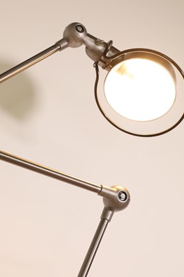 Lot 396 - A Jieldé polished steel articulated lamp