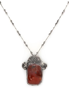 Lot 1212 - A silver amber pendant